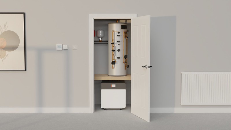 Shoebox NX and hot water cylinder in cupboard. 